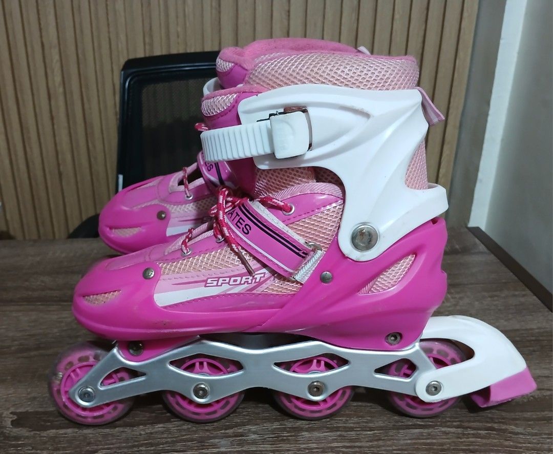 Pink and White Inline Skates Sport Skates (Category: Skates, Rollerblades & Scooters) located in Manila. Submitted by cooltree-540c (Listing ID 1466778078, Image 1). Description: - Color: Cute pink and white design - Fit: Adjustable strap, buckle closure, and laces with soft mesh padding for extra comfort - Frame & Wheels: Sturdy silver aluminum frame with smooth-rolling pink wheels - Safety: Equipped with a rear brake on the right skate - Condit