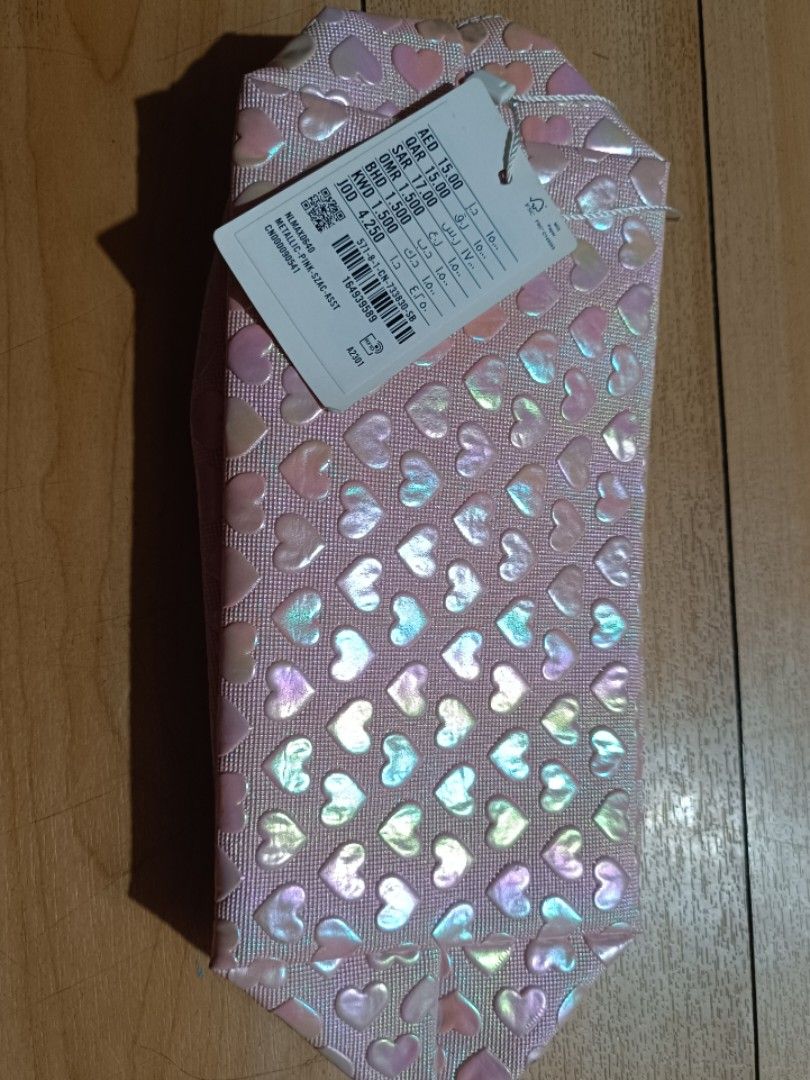 Pink Metallic Heart Pouch (Category: Purses & Pouches) located in Quezon City. Submitted by pumpkinspice08 (Listing ID 1466927099, Image 2). Description: shipping c/o buyer.