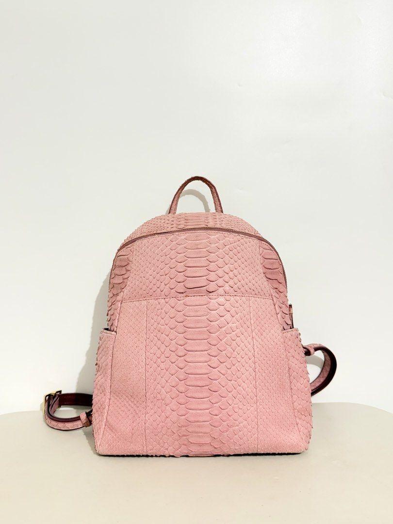 Pink Python Leather Backpack (Category: Luxury Bags & Wallets) located in Manila. Submitted by coachiqueclosetbysuei_3rdaccnt (Listing ID 1466942615, Image 1). Description: 💫 Pink python leather backpack 💫 𝐒𝐨𝐮𝐫𝐜𝐞: Japan🇯🇵 💫 𝐈𝐬𝐬𝐮𝐞: None 💫 𝐂𝐨𝐧𝐝𝐢𝐭𝐢𝐨𝐧: 10/10 Excellent Condition 💫 𝐎𝐭𝐡𝐞𝐫𝐬: Good for everyday Bag 💫 The color may vary due to lighting 💫 What you see is what you get ——————𝓜𝓾𝓼𝓽 𝓡𝓮𝓪𝓭!——————— 📍 𝐋𝐨�