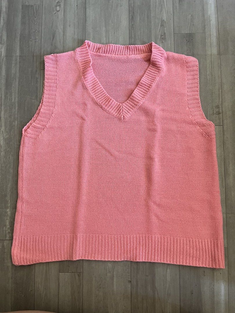 Pink V-Neck Knit Sweater Vest (Category: Sleeveless) located in Subic. Submitted by yuridecluttersxz (Listing ID 1466807013, Image 1). Description: V-Neck Sweater Vest - Color: bright pink - Details: Ribbed trim on neckline, armholes, and hem - Fit: Relaxed and soft knit fabric Shipping: Delivery via J&T or meet-up around Olongapo City / SBFZ area. Shipping fees c/o buyer. MOP: GCash.