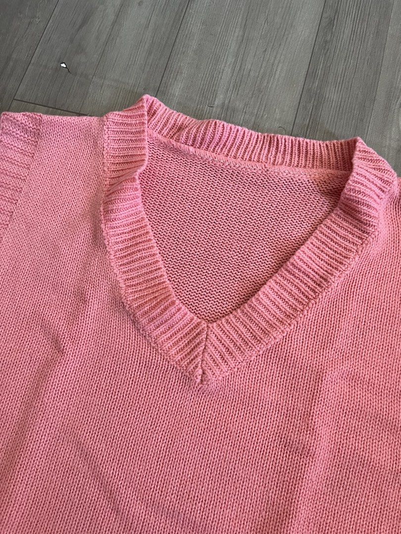 Pink V-Neck Knit Sweater Vest (Category: Sleeveless) located in Subic. Submitted by yuridecluttersxz (Listing ID 1466807013, Image 2). Description: V-Neck Sweater Vest - Color: bright pink - Details: Ribbed trim on neckline, armholes, and hem - Fit: Relaxed and soft knit fabric Shipping: Delivery via J&T or meet-up around Olongapo City / SBFZ area. Shipping fees c/o buyer. MOP: GCash.
