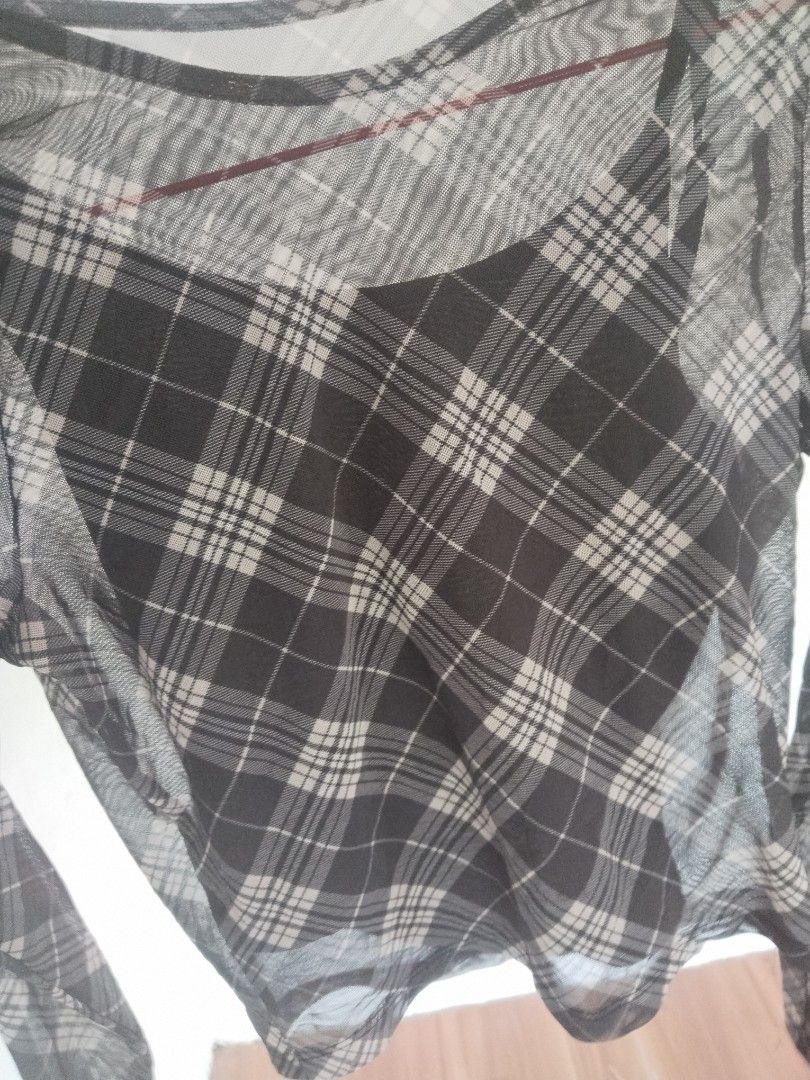 Plaid Mesh Tops Size Small (Category: Blouses) located in Mabalacat. Submitted by al_amin_thrift (Listing ID 1466863578, Image 2). Description: 🖤 Hollister Sheer Plaid Mesh Top — Size S ✔️ Authentic Hollister California — Made in Turkey ✔️ Dark grey plaid design — chic & versatile ✔️ Sheer mesh fabric — lightweight & breathable ✔️ Long sleeve, boat neck, cropped fit ✔️ Size S — 165/88A ✔️ Material: 96% Polyester, 4% Spandex — soft & stretchy ✔️ 