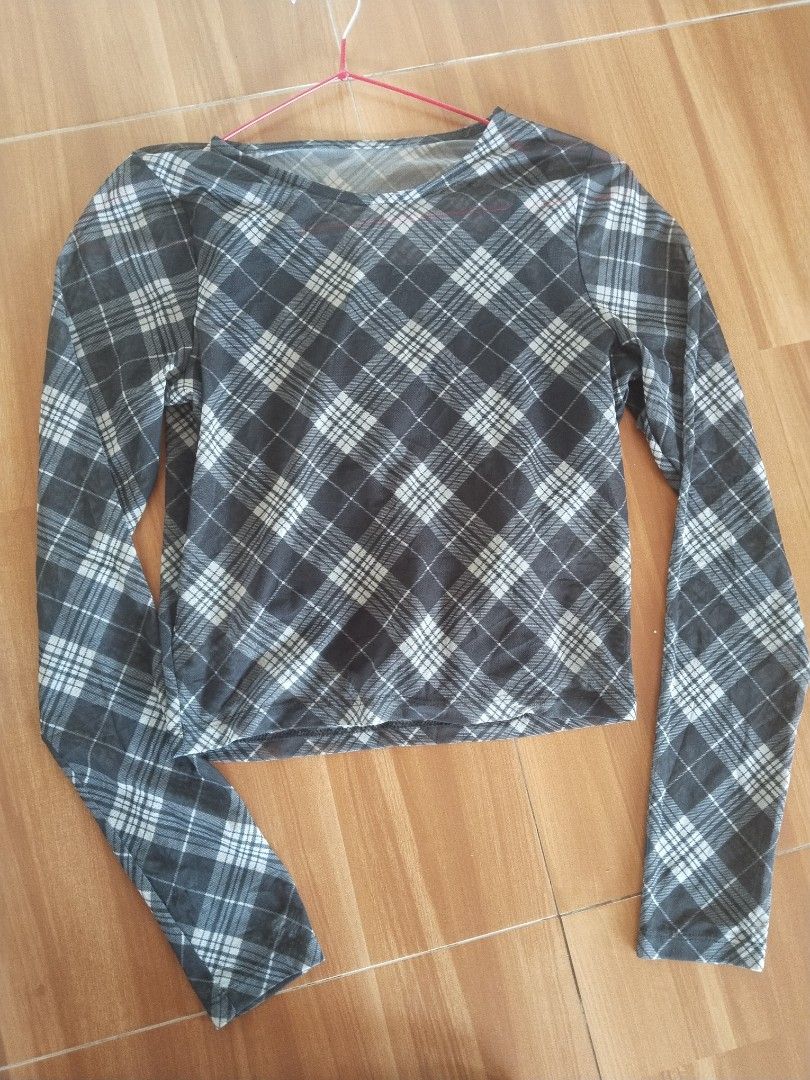 Plaid Mesh Tops Size Small (Category: Blouses) located in Mabalacat. Submitted by al_amin_thrift (Listing ID 1466863578, Image 1). Description: 🖤 Hollister Sheer Plaid Mesh Top — Size S ✔️ Authentic Hollister California — Made in Turkey ✔️ Dark grey plaid design — chic & versatile ✔️ Sheer mesh fabric — lightweight & breathable ✔️ Long sleeve, boat neck, cropped fit ✔️ Size S — 165/88A ✔️ Material: 96% Polyester, 4% Spandex — soft & stretchy ✔️ 