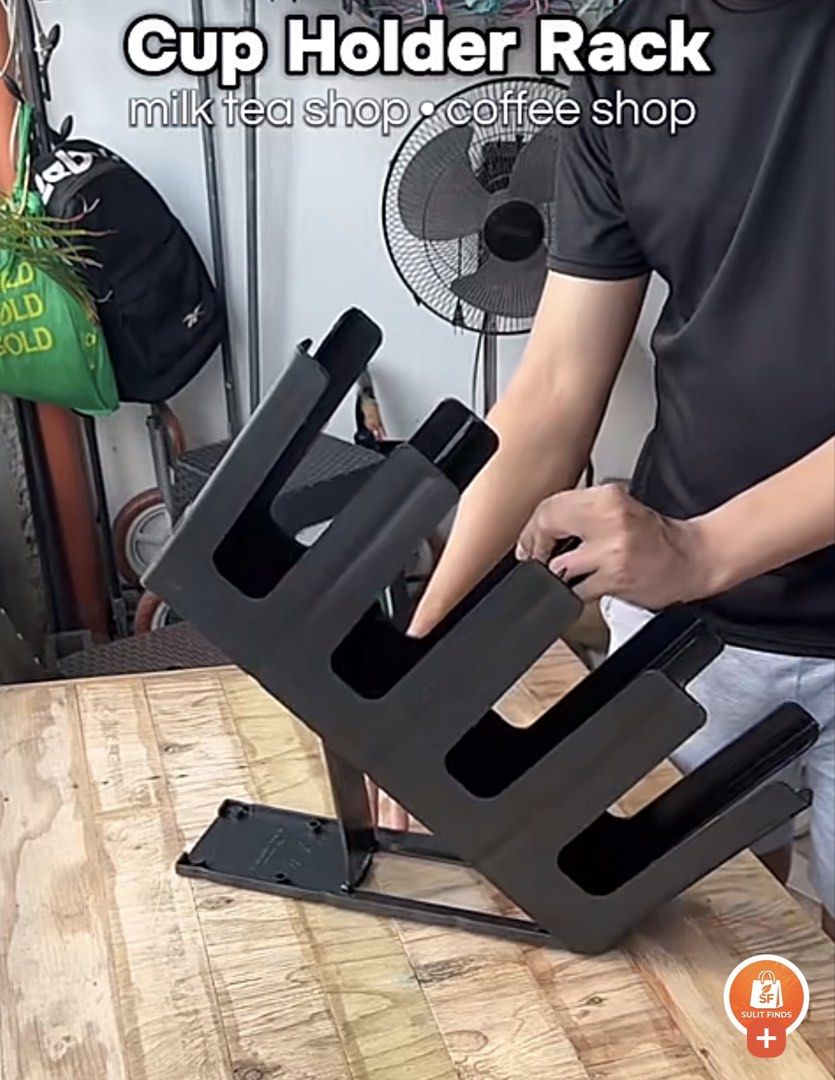 Plastic/Paper Cup Holder Rack (Category: Coffee & Tea Tableware) located in Pasig City. Submitted by wokingmomdeclutter (Listing ID 1448261548, Image 2). Description: Needs cleaning. Napatambak po kasi. Adjustable po ang stand nito. 2nd photo for reference only..