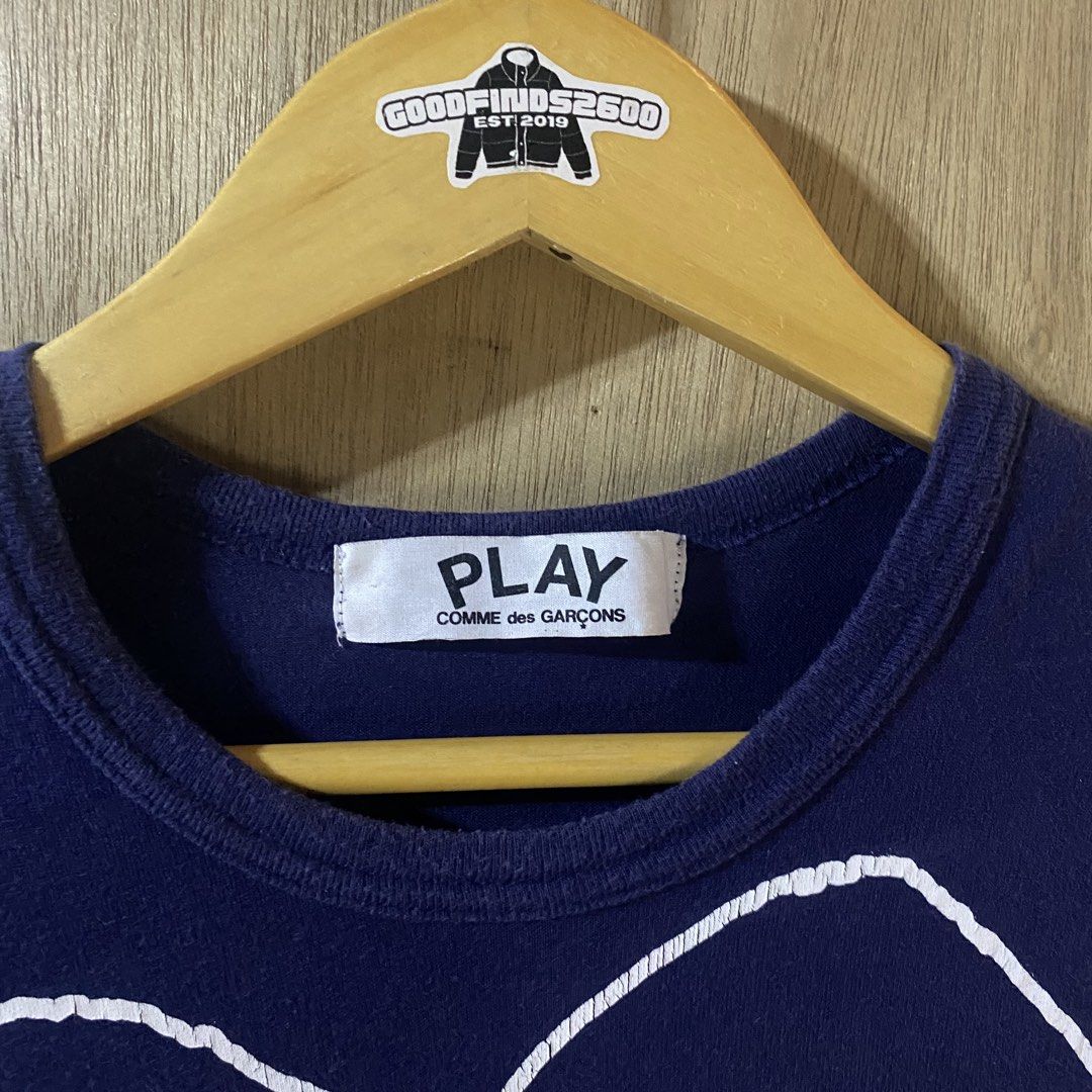 Play CDG Outline Shirt for Her (Category: Shirts) located in Baguio. Submitted by goodfinds2600v2 (Listing ID 1466892543, Image 3). Description: Size on tag: fits S-M Dimensions: L-24 W/Bust-15.5 Description: womens Condition: Very good Issue/s: 8.5/10 color rate, cut washtag, print cracks .
