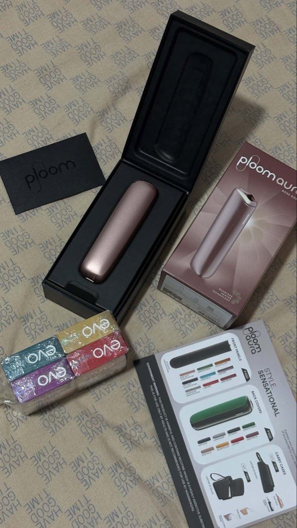 Ploom AURA Tobacco Heating Device (Category: Home Fragrance) located in Dagupan City. Submitted by tiffy.clo (Listing ID 1466904550, Image 3). Description: - Product: Ploom AURA tobacco heating device bundle - Condition: Clean, complete with original box and accessories - Inclusions: Comes with packs of EVO tobacco sticks - Colors available: Rose Gold or Jet Black (PM your choice) - Benefit: Simple, smoke-free swap from traditional cigarettes.