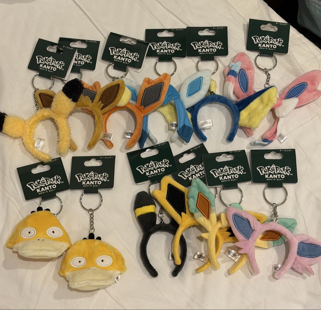 PokéPark Kanto Pokémon Headband Keychains Assorted Collection (Category: Character Goods) located in Santa Maria. Submitted by itsvener (Listing ID 1466920968, Image 2). Description: - Official PokéPark Kanto Pokémon headband/headgear keychains - Available characters: Pikachu, Psyduck, and Eevee evolutions (Umbreon, Sylveon, Flareon, Glaceon, Vaporeon, Jolteon, Espeon) - Condition: Brand new, still attached to original header cards with key rings