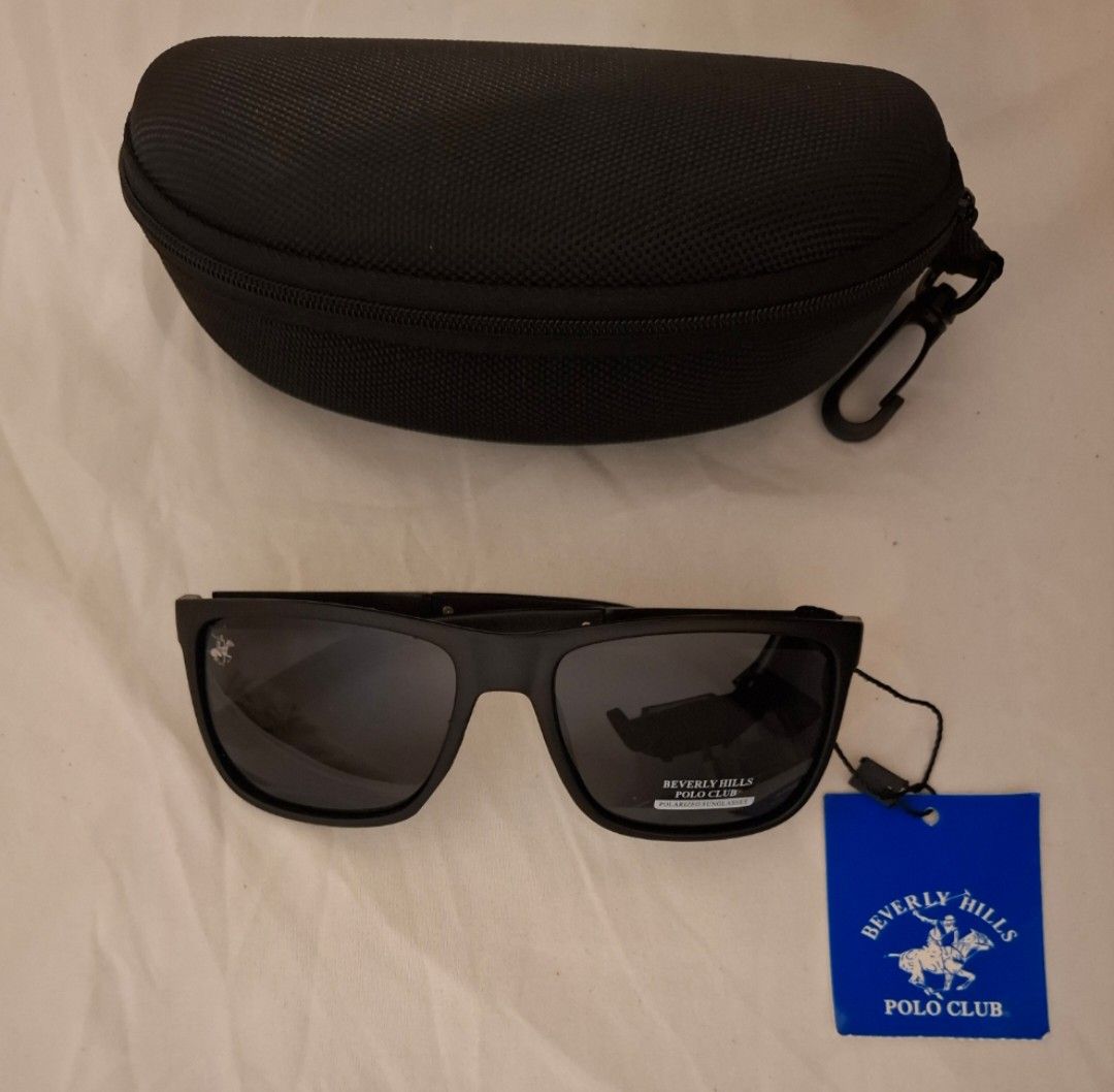 Polarized Sunglasses with Case (Category: Sunglasses & Eyewear) located in Calamba. Submitted by mrq.io (Listing ID 1466931391, Image 1). Description: Beverly Hills Polo Club Condition: Brand new Lens Type: Polarized, dark lenses Extra Glasses 📦 Shipping available nationwide 📍 Calamba, Laguna.