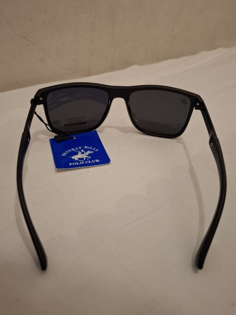 Polarized Sunglasses with Case (Category: Sunglasses & Eyewear) located in Calamba. Submitted by mrq.io (Listing ID 1466931391, Image 3). Description: Beverly Hills Polo Club Condition: Brand new Lens Type: Polarized, dark lenses Extra Glasses 📦 Shipping available nationwide 📍 Calamba, Laguna.