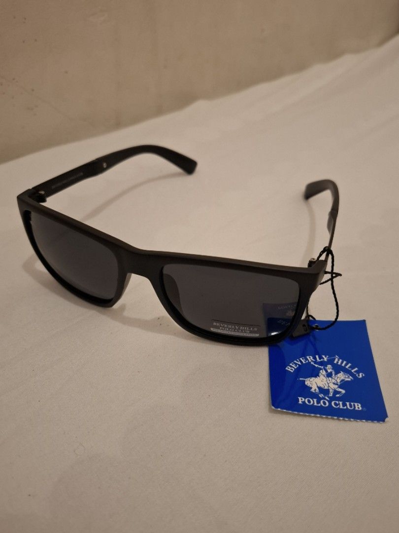 Polarized Sunglasses with Case (Category: Sunglasses & Eyewear) located in Calamba. Submitted by mrq.io (Listing ID 1466931391, Image 2). Description: Beverly Hills Polo Club Condition: Brand new Lens Type: Polarized, dark lenses Extra Glasses 📦 Shipping available nationwide 📍 Calamba, Laguna.