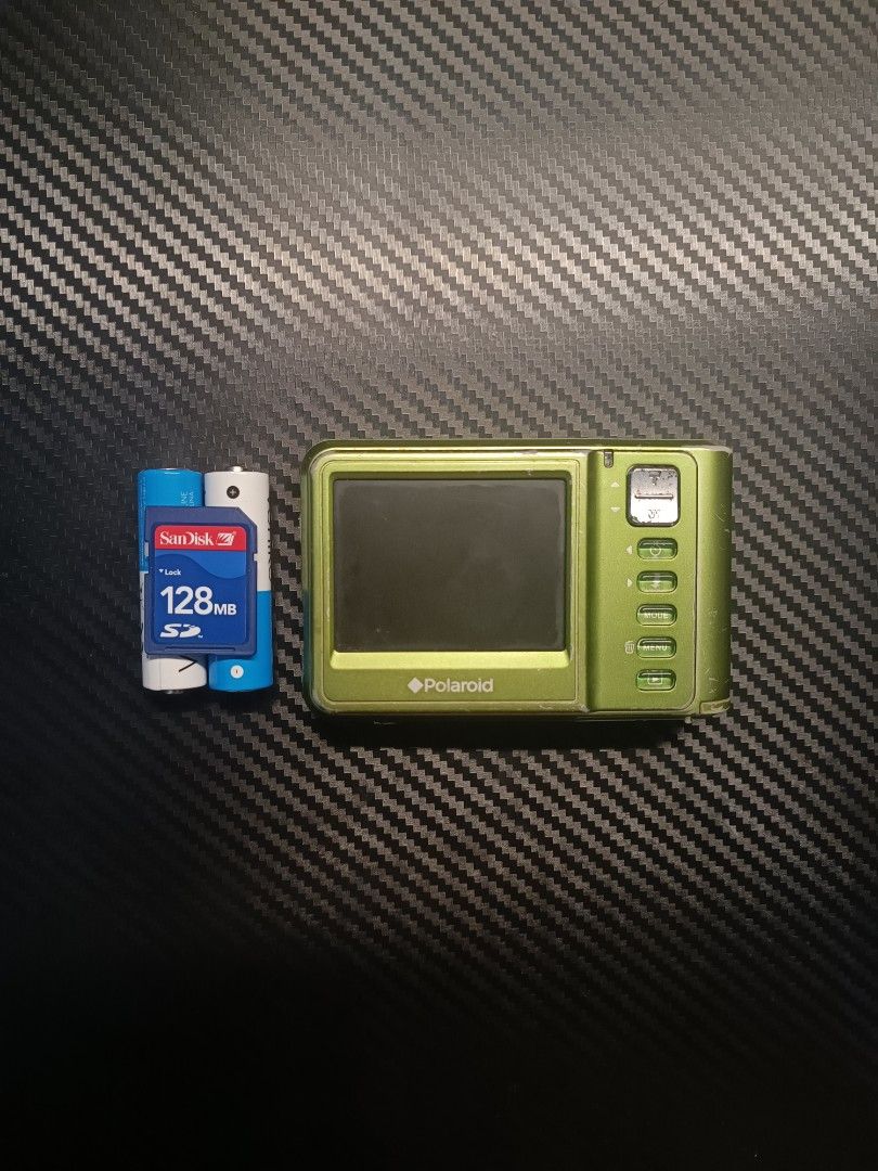 Polaroid A930 (Category: Cameras) located in Manila. Submitted by existir (Listing ID 1466839335, Image 2). Description: 📷 Polaroid A930 - 9MP sensor - 3× optical zoom - 2.4" LCD screen - Working zoom and flash - Clean output Issues: - Exterior metal parts have some rust - Body has noticeable cosmetic wear Inclusions: - Unit - Battery - Memory card 850 + sf Please ask and check photos and sample output before buying. Manage your expectations reg