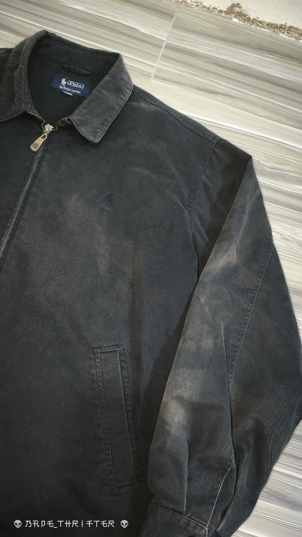 Polo by Ralph Lauren Black Zip Jacket (Category: Coats, Jackets and Outerwear) located in Lingayen. Submitted by c7quiter84444 (Listing ID 1466932718, Image 3). Description: - Brand: Polo by Ralph Lauren - Style: Classic black zip-up jacket - Size: 180/95A - Details: Pointed collar, custom branded metal zipper pull, subtle embroidered pony logo - Features: Buttoned cuffs, side hand pockets, and cool branded interior lining - Condition: Great vint