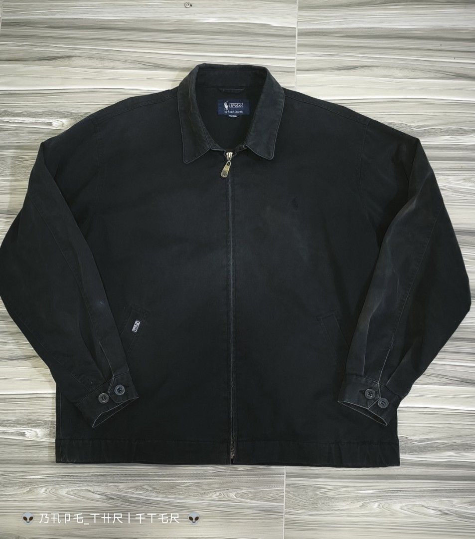 Polo by Ralph Lauren Black Zip Jacket (Category: Coats, Jackets and Outerwear) located in Lingayen. Submitted by c7quiter84444 (Listing ID 1466932718, Image 1). Description: - Brand: Polo by Ralph Lauren - Style: Classic black zip-up jacket - Size: 180/95A - Details: Pointed collar, custom branded metal zipper pull, subtle embroidered pony logo - Features: Buttoned cuffs, side hand pockets, and cool branded interior lining - Condition: Great vint