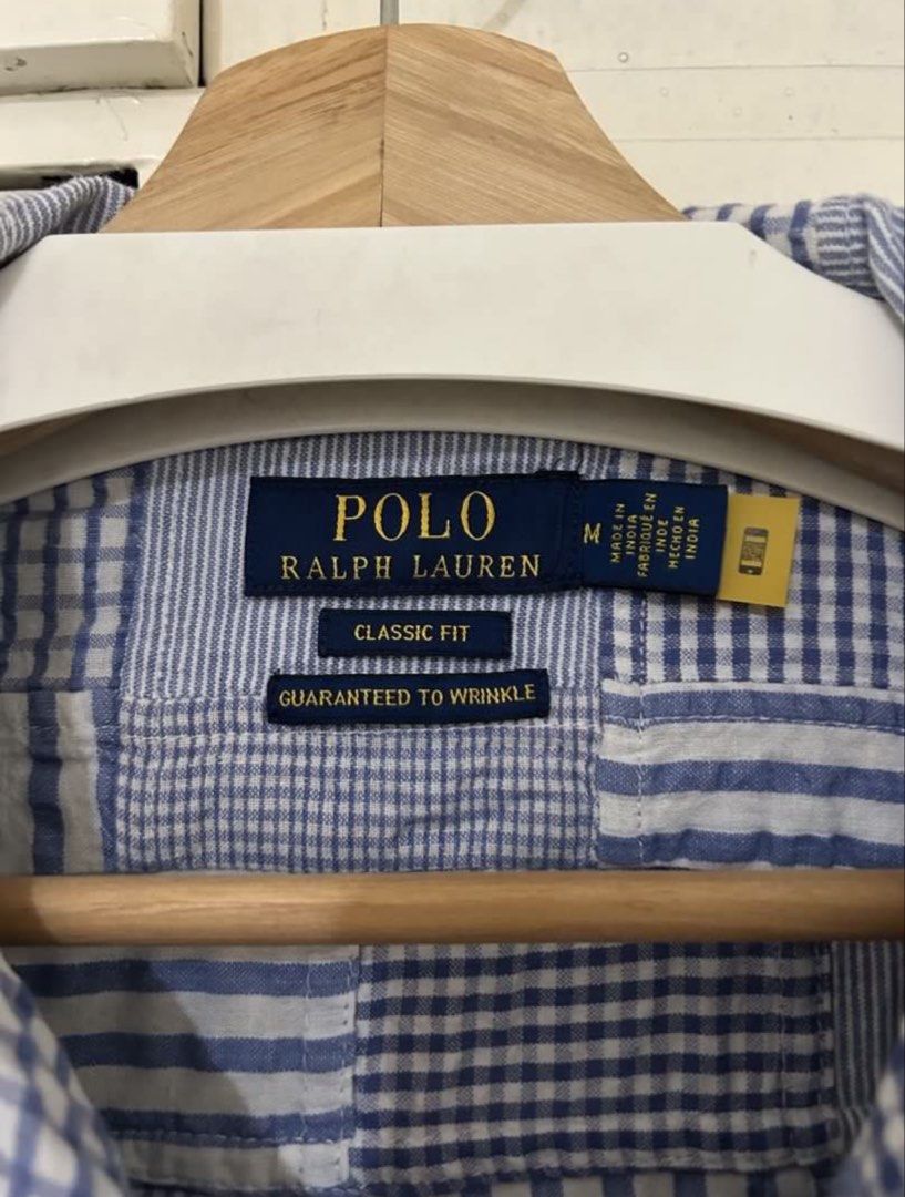 Polo Ralph Lauren Patchwork Seersucker Shirt (Category: Tshirts & Polo Shirts ) located in Paranaque City. Submitted by snkrsnstuff (Listing ID 1466862124, Image 3). Description: - Polo Ralph Lauren Patchwork Seersucker Shirt - Classic Fit - Size: Medium - Condition: used once, good as new - Blue & White Patchwork Design - Chest Pocket with Signature Polo Logo Dimensions: - Shoulders: 18in - Chest: 23in - Sleeve: 9.5in - Length: 29in.