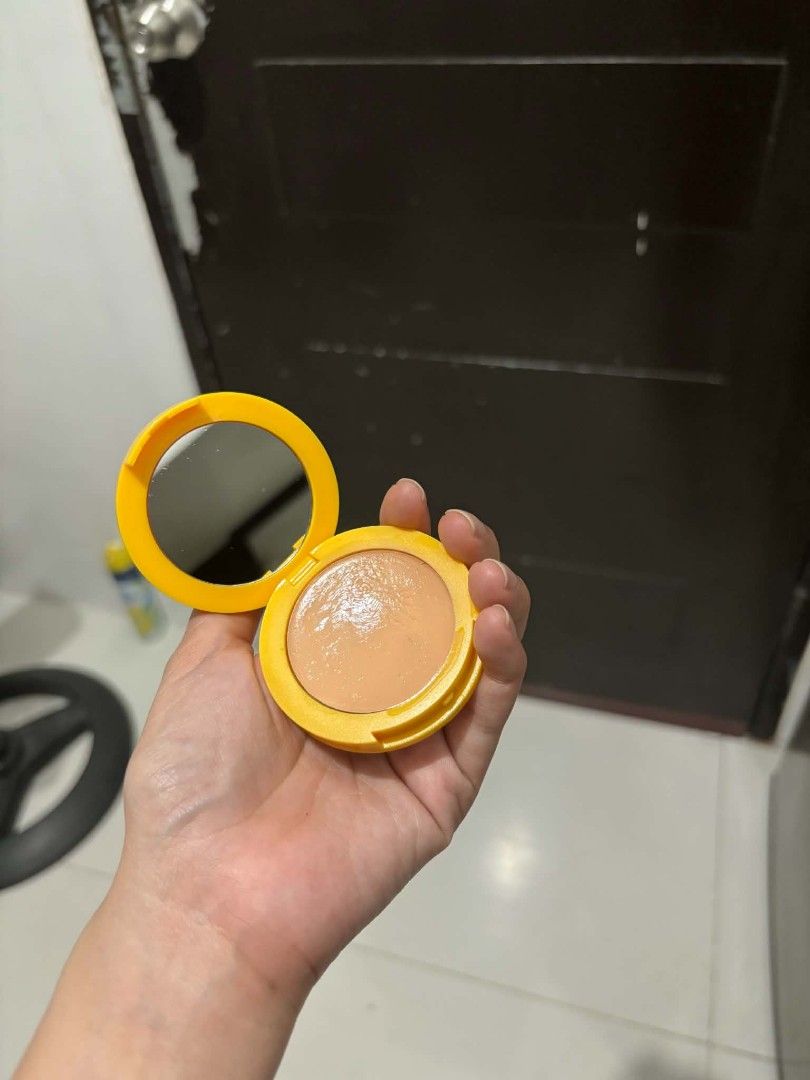 Popique compact powder yellow case (Category: Makeup) located in Angono. Submitted by janicah0202 (Listing ID 1466782083, Image 2). Description: - Brand: Popique compact makeup - Packaging: Bright yellow round case with a built-in mirror - Shade: Light beige cream - Condition: Swatched and lightly used - Size: Handheld and travel-friendly for easy touch-ups - Reason for selling: Closet/makeup declutter.