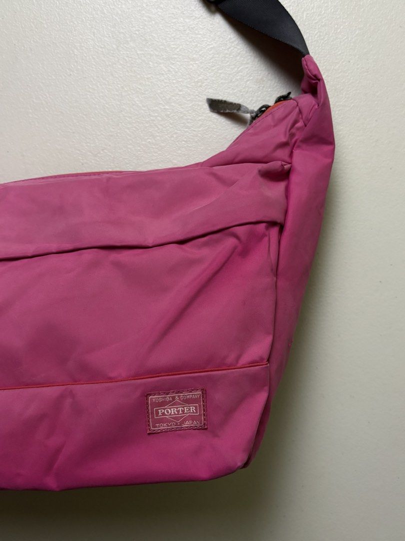 Porter - Yoshida & Co. - Mouse Shoulder Bag ( pink ) (Category: Luxury Bags & Wallets) located in Manila. Submitted by hippiesph (Listing ID 1466967021, Image 3). Description: Porter - Yoshida & Co. - Mouse Shoulder Bag ( pink ) Vgood condition Guaranteed authentic Color rate: 9/10 Issue: scratch on corner and faded handle puller Price: 1,200 + sf.