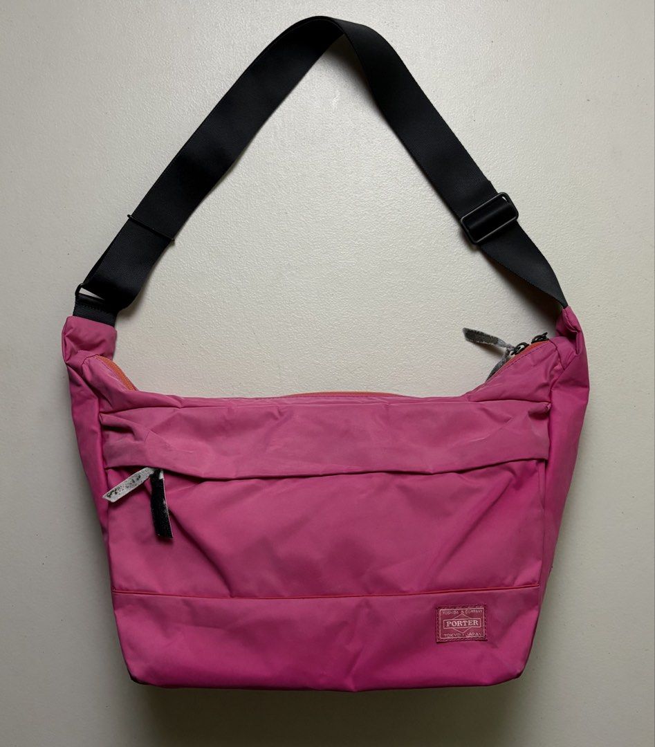 Porter - Yoshida & Co. - Mouse Shoulder Bag ( pink ) (Category: Luxury Bags & Wallets) located in Manila. Submitted by hippiesph (Listing ID 1466967021, Image 1). Description: Porter - Yoshida & Co. - Mouse Shoulder Bag ( pink ) Vgood condition Guaranteed authentic Color rate: 9/10 Issue: scratch on corner and faded handle puller Price: 1,200 + sf.