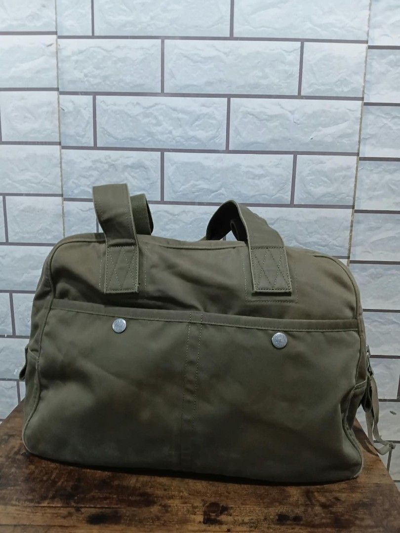 Porter x love & peace boston bag (Category: Briefcases) located in Las Pinas. Submitted by kuya_erick (Listing ID 1466814843, Image 2). Description: porter x love & peace boston bag complete details posted 3500 + sf las pinas meet up.