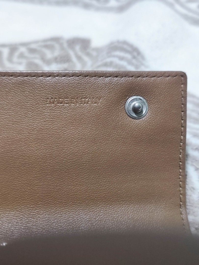 Prada Crocodile Embossed Leather Long Wallet with Authenticity Card (Category: Wallets & Card holders) located in Manila. Submitted by chingmabut07171 (Listing ID 1466607175, Image 3). Description: - Authentic Prada long wallet in rich tan crocodile-embossed leather - Secure bi-fold closure style - Includes original authenticity card and dark blue envelope holder - Spacious interior fits cards, cash, and receipts easily - Classic luxury piece per