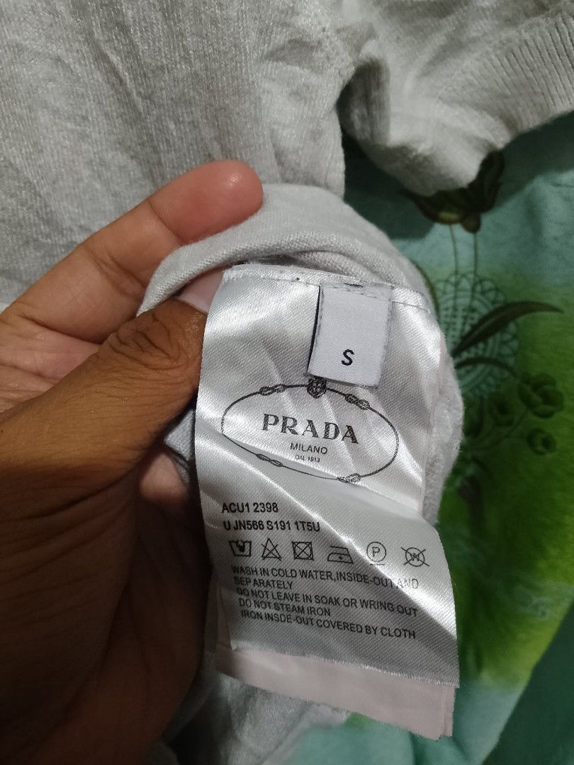 PRADA MILANO KNITTED (Category: Blouses) located in Manila. Submitted by the.good.thrift (Listing ID 1466946004, Image 2). Description: PRADA MILANO KNITTED SIZE SMALL AS NEW CONDITION.