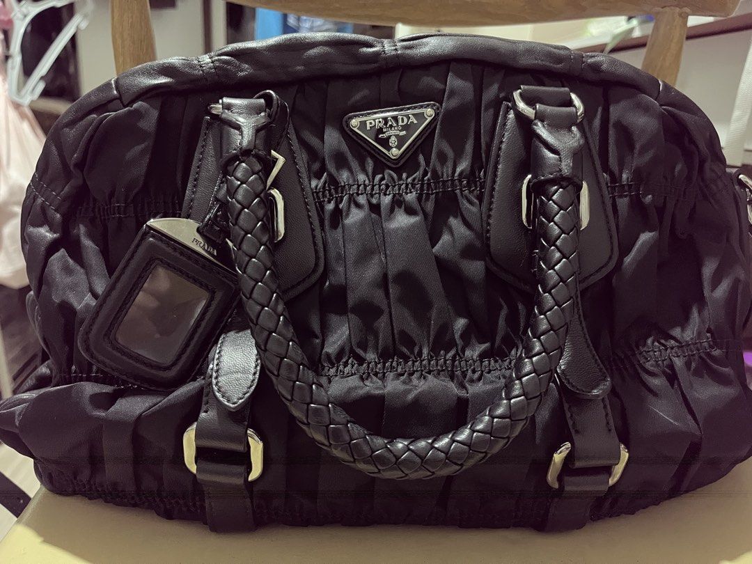 PRADA TESSUTO GAUFRE (Category: Luxury Bags & Wallets) located in Quezon City. Submitted by dropshopselections (Listing ID 1466887480, Image 2). Description: original calf leather and tessuto nylon complete inclusions (authenticity cards, hang tag, strap, dustbag) excellent condition.