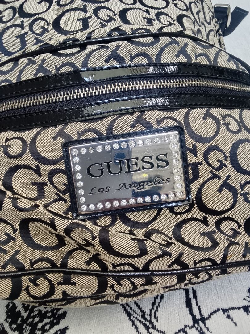 Pre owned Guess Bagpack (Category: Backpacks) located in Quezon City. Submitted by kema2191 (Listing ID 1466815522, Image 3). Description: .