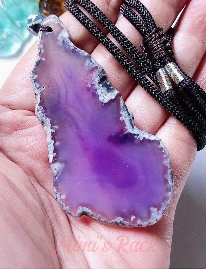 PURPLE MINI AGATE SLICE STONE ROPE NECKLACE (Category: Necklaces) located in Taguig. Submitted by mimisrack (Listing ID 1466863008, Image 2). Description: 💜Petite natural slice with calming purple elegance -Purple Agate symbolizes balance, protection, and inner stability -Natural slice design highlights unique banding patterns -Each piece is one-of-a-kind -no two slices are the same -Encourages emotional grounding and steady confidence -Mini siz