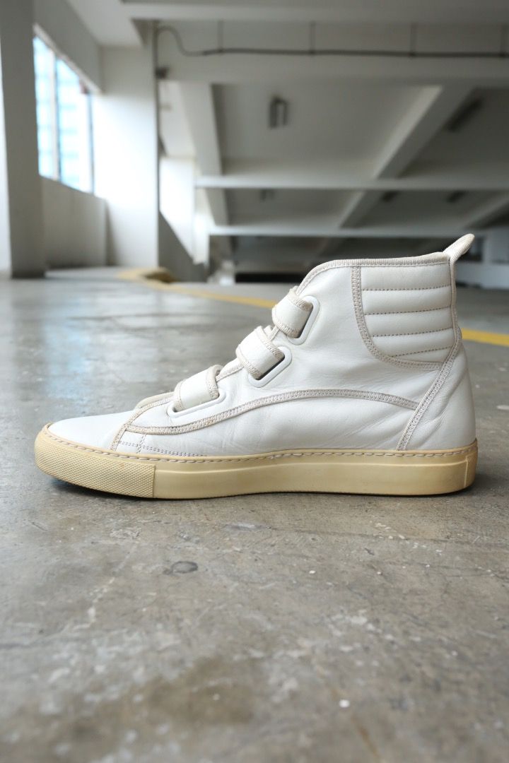 Raf Simons - S/S 05 - High-Top Velcro Sneakers (Category: Sneakers) located in Manila. Submitted by graymatter_ (Listing ID 1466847657, Image 3). Description: Raf Simons - S/S 05 - High-Top Velcro Sneakers OG release Tagged Size: 42 Condition: 8/10 Flaws: Signs of Usage, Minor Cracking of Outsole Material: Leather Made in: Italy.