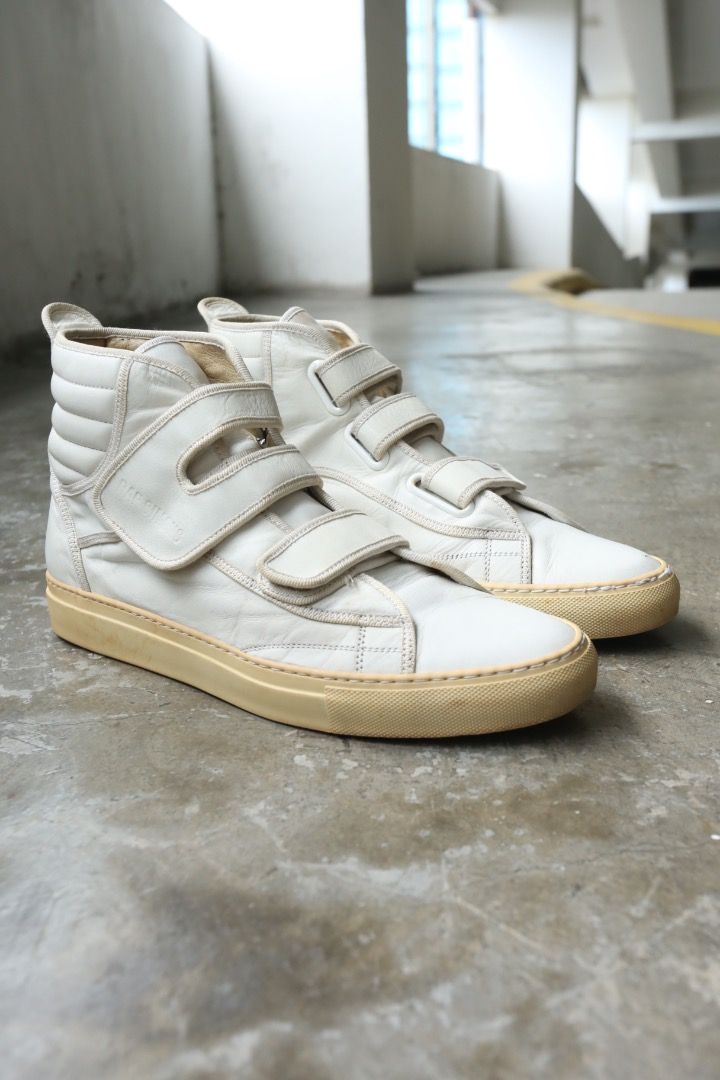 Raf Simons - S/S 05 - High-Top Velcro Sneakers (Category: Sneakers) located in Manila. Submitted by graymatter_ (Listing ID 1466847657, Image 1). Description: Raf Simons - S/S 05 - High-Top Velcro Sneakers OG release Tagged Size: 42 Condition: 8/10 Flaws: Signs of Usage, Minor Cracking of Outsole Material: Leather Made in: Italy.