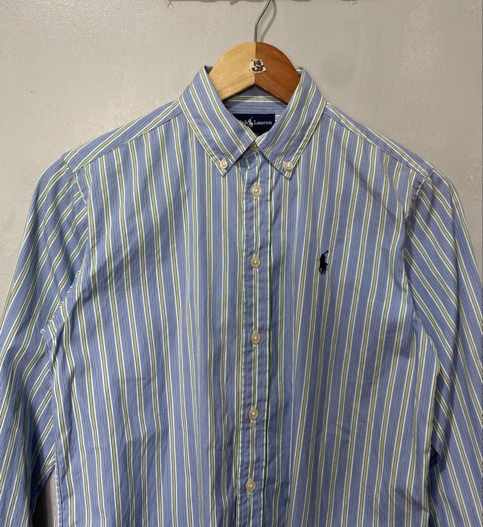 RALPH LAUREN (Category: Longsleeves) located in Quezon City. Submitted by fast_break (Listing ID 1466969551, Image 1). Description: RALPH LAUREN LONGSLEEVE - BUTTON DOWN COLOR: BLUE STRIPE SIZE: M ON TAG DIMES: W19 x 25L📏 COLOR RATE:9.8/10 EXCELLENT CONDITION AS NEW ✅ NO ISSUE LOC:NOVA QC📍 DM TO PURCHASE 💌.