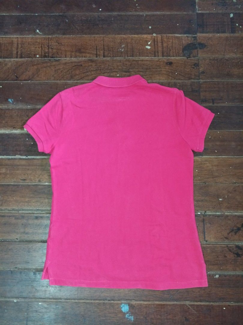 Ralph Lauren Polo Pink (Category: Activewear) located in Lucena. Submitted by thriftsivu (Listing ID 1466862828, Image 2). Description: Size large on tag Shoulder -15.5 width - 19 length - front 25 back 26 In Good condition Color rate 8/10 womens polo shirt pwede mens small/medium body frame.