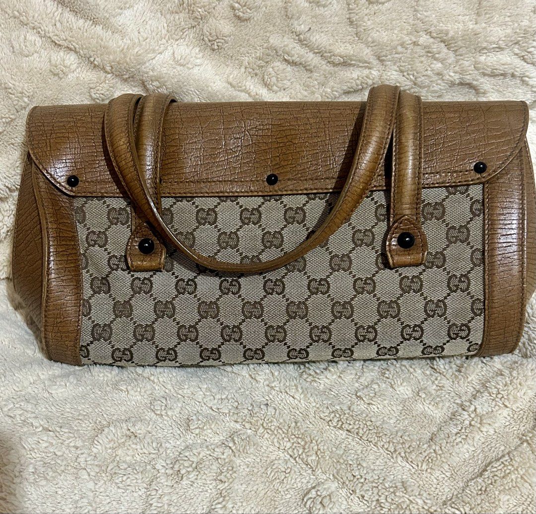 Rare Authentic vintage Gucci bullet bamboo bag (Category: Luxury Bags & Wallets) located in Cebu City. Submitted by vedazzle (Listing ID 1466911921, Image 3). Description: 📍Super pretty and classy vintage shoulder bag 📍Very spacious and functional 📍Clean interior and exterior 📍Color may vary due to lighting 📍Pm for more details.