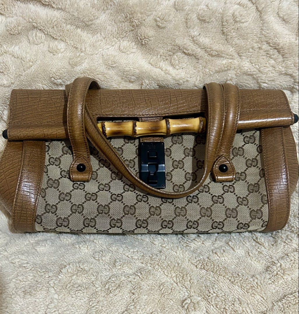 Rare Authentic vintage Gucci bullet bamboo bag (Category: Luxury Bags & Wallets) located in Cebu City. Submitted by vedazzle (Listing ID 1466911921, Image 1). Description: 📍Super pretty and classy vintage shoulder bag 📍Very spacious and functional 📍Clean interior and exterior 📍Color may vary due to lighting 📍Pm for more details.