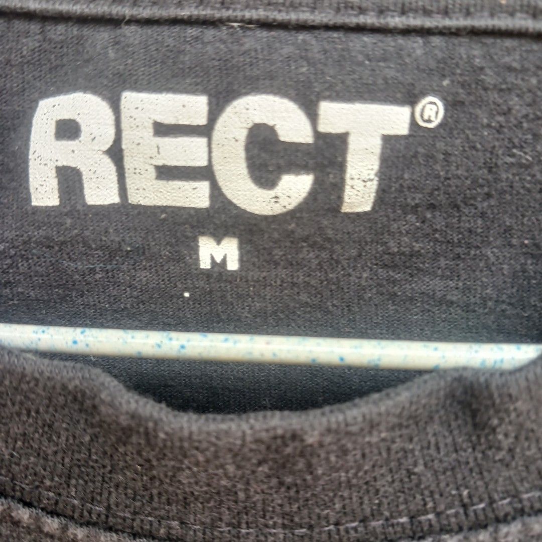 RECT (Category: Tshirts & Polo Shirts) located in Melaka Tengah. Submitted by frrsazz (Listing ID 1466851721, Image 3). Description: - Brand/Model: RECT Black T-Shirt - Size: Medium (M) - Design: Large white abstract graphic print with 'Volition' lettering on the front - Material: Comfortable cotton - Style: Short sleeves, crew neck, ideal for alternative streetwear - Condition: Good addition to any wardrobe.