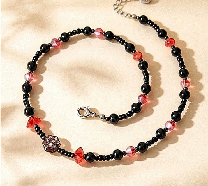 Red and Black Beads Design Preloved Necklace (Category: Necklaces) located in Manila. Submitted by amne.hub (Listing ID 1466928041, Image 1). Description: Best for travels or casual use Red and black beads design Definitely in good condition #necklace #red #black #bead #design.