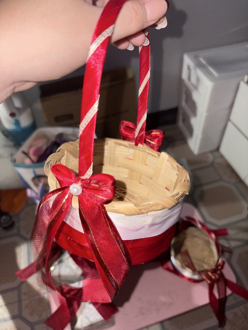 Red and White Wedding Decor Ribbons Baskets Pillows (Category: Occasions & Party Supplies) located in Manila. Submitted by triz_micolle (Listing ID 1466961189, Image 2). Description: SELLING MY PRELOVED WEDDING ESSENTIALS AS A GRADUATE BRIDE 🥹 BURGUNDY THEME My wedding was this July 31, some of the items are not used po but nagtastas na ung tela and some beads are missing na - Ring pillow - Coin pillow (not used) - 3 Flower girl baskets - 3 Gift