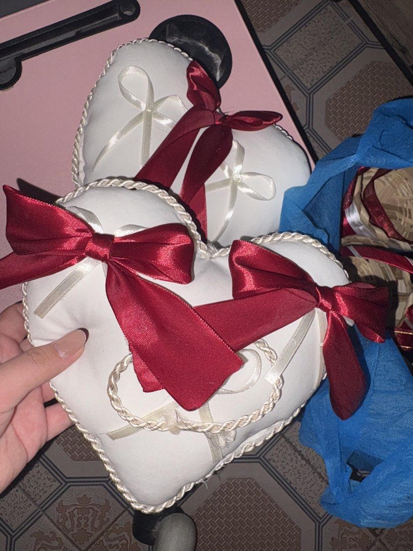 Red and White Wedding Decor Ribbons Baskets Pillows (Category: Occasions & Party Supplies) located in Manila. Submitted by triz_micolle (Listing ID 1466961189, Image 1). Description: SELLING MY PRELOVED WEDDING ESSENTIALS AS A GRADUATE BRIDE 🥹 BURGUNDY THEME My wedding was this July 31, some of the items are not used po but nagtastas na ung tela and some beads are missing na - Ring pillow - Coin pillow (not used) - 3 Flower girl baskets - 3 Gift