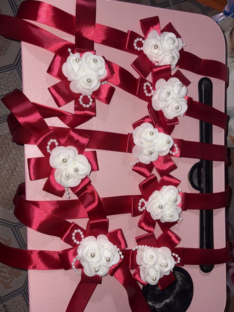 Red and White Wedding Decor Ribbons Baskets Pillows (Category: Occasions & Party Supplies) located in Manila. Submitted by triz_micolle (Listing ID 1466961189, Image 3). Description: SELLING MY PRELOVED WEDDING ESSENTIALS AS A GRADUATE BRIDE 🥹 BURGUNDY THEME My wedding was this July 31, some of the items are not used po but nagtastas na ung tela and some beads are missing na - Ring pillow - Coin pillow (not used) - 3 Flower girl baskets - 3 Gift