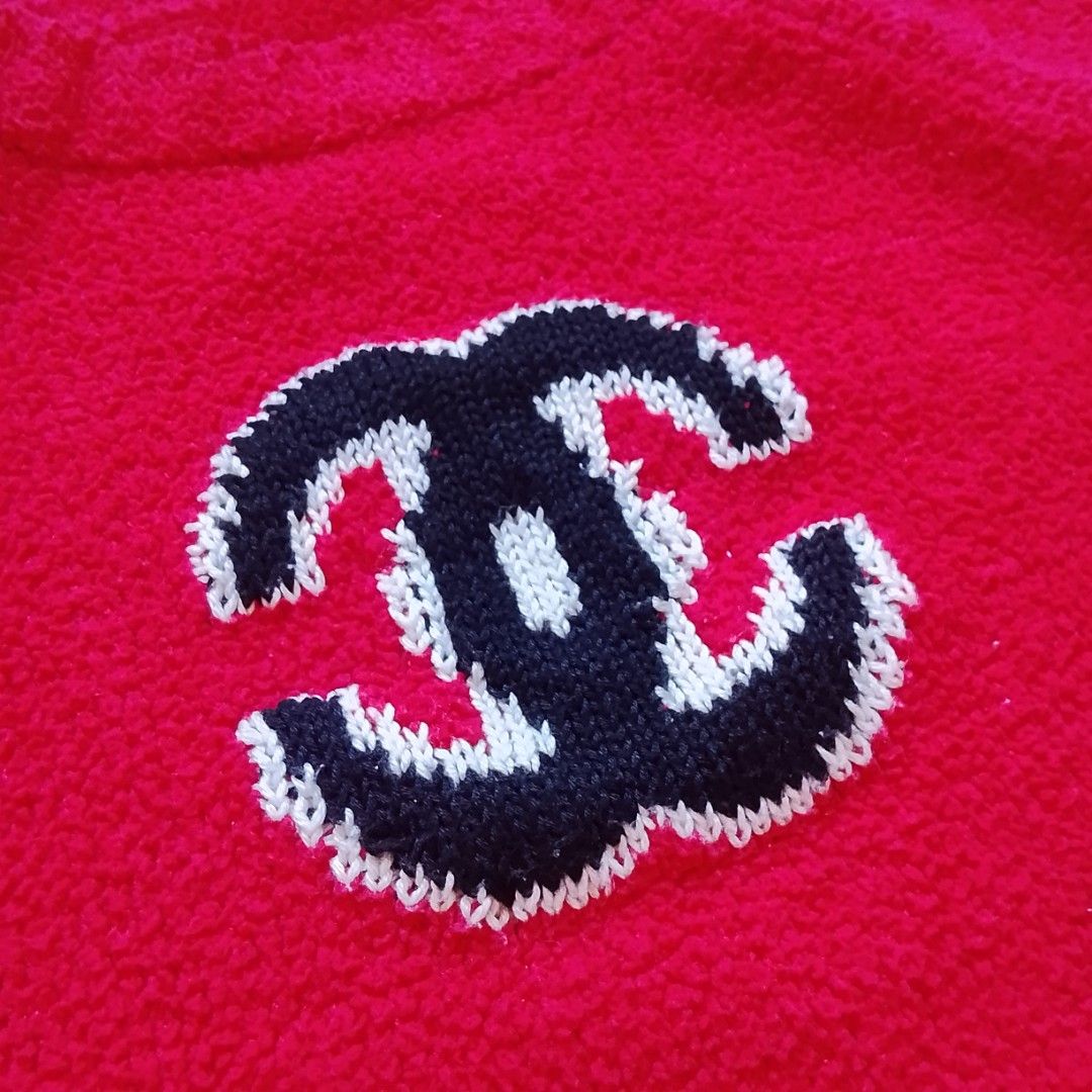 Red Chanel Alternative Sweater (Category: Luxury Apparel) located in Angeles City. Submitted by sselects_ (Listing ID 1466785990, Image 2). Description: Details of the item: *Color may vary due to lighting Size: fits S-M Width: 20" Length: 21" Sleeves: 19" Issue: needs wash Condition: Excellent ALL ITEMS ARE NEGOTIABLE.