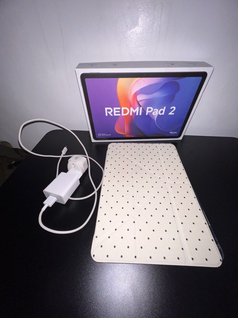 Redmi Pad 2 (Category: Android) located in Las Pinas. Submitted by ekagaria (Listing ID 1466791546, Image 2). Description: Redmi Pad 2 128gb + 4gb Color: Graphite Gray Original Price: 11,999 Selling Price: 10k (negotiable for sure buyer) Inclusions: Box 1 Case 1 Pen Charger w/ adaptor Rfs: di naman nagagamit masyado nung nabili, lady owner kaya looks like brand new po (pwede po swap for iPad).