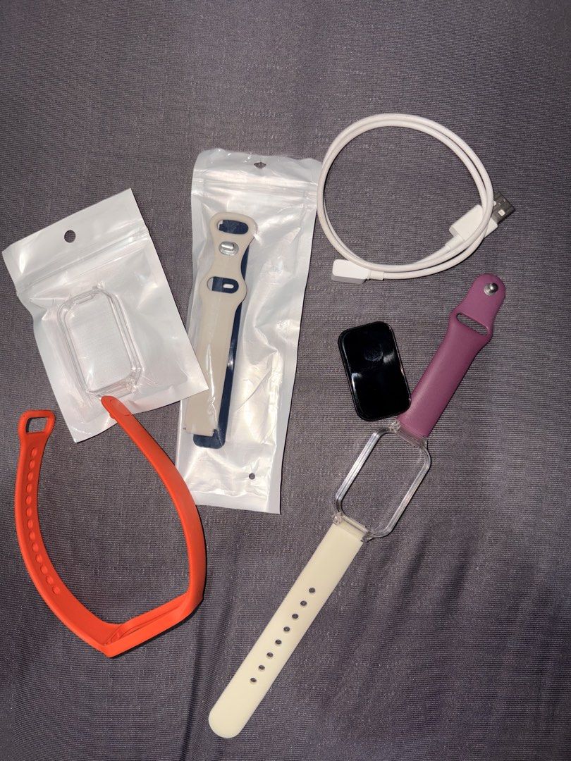 Redmi Smart Band 2 (Category: Wearables & Smart Watches) located in Pateros City. Submitted by aureamae_ (Listing ID 1466836081, Image 1). Description: - Brand/Model: Redmi Smart Band 2 - Condition: Pre-owned with minor screen scratches, fully functional - Includes Original charging cable - Purple & white strap used - Black & white strap with case & Orange - new .