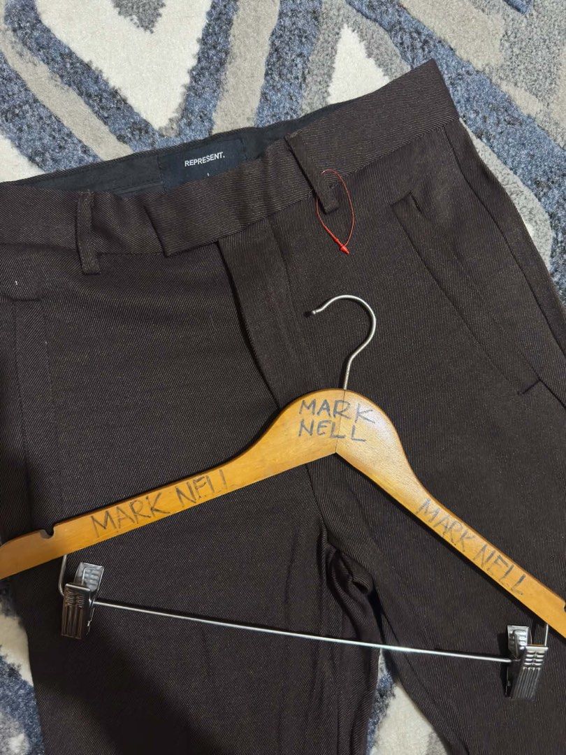 Represent Brown Cotton Trousers Pants Size S (Category: Trousers) located in Caloocan City. Submitted by mrknll (Listing ID 1466869731, Image 3). Description: - Size: S - Color: Solid dark brown - Material: 100% cotton (Made in China) - Fit: Straight leg cut - Details: Clean stitch detailing, belt loops, zip fly with button closure - Pockets: Front slant pockets and back welt pockets.