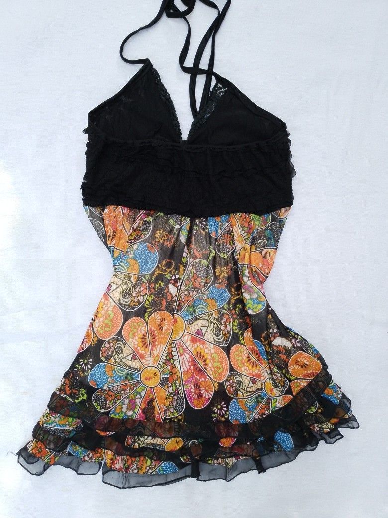 Reworked Whimsy Halter Top (Category: Sleeveless) located in Laur. Submitted by zystilo (Listing ID 1466886188, Image 3). Description: — small - medium — reworked — no issue - strictly no cancellation. please be sure because commenting.