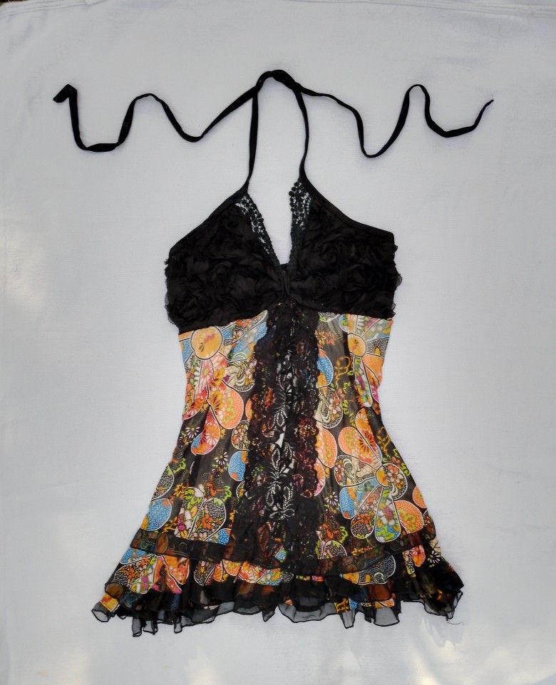 Reworked Whimsy Halter Top (Category: Sleeveless) located in Laur. Submitted by zystilo (Listing ID 1466886188, Image 1). Description: — small - medium — reworked — no issue - strictly no cancellation. please be sure because commenting.