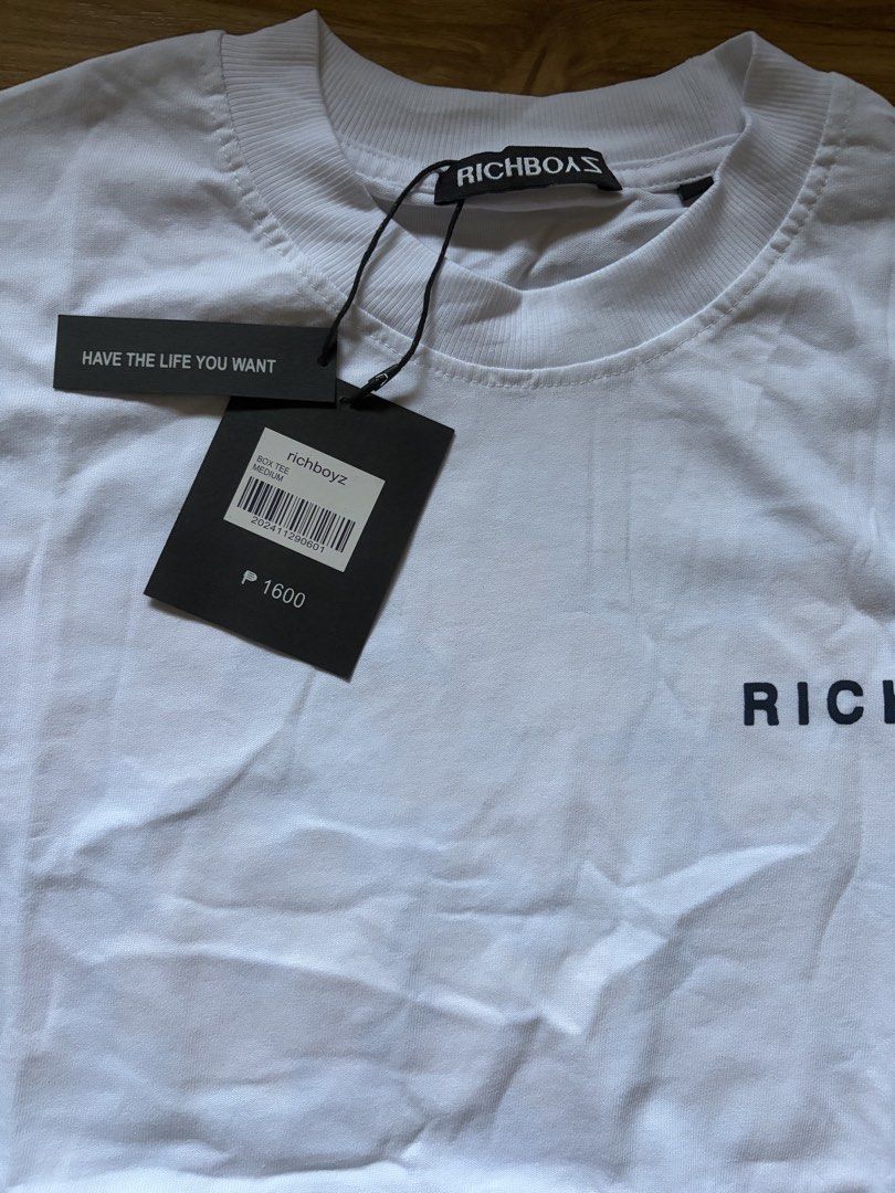 Richboyz Box Tee Shirt (Category: Tshirts & Polo Shirts ) located in San Pedro. Submitted by nikkiabc.777 (Listing ID 1466807275, Image 3). Description: Richboyz Box Tee Shirt - size: Medium - brandnew; with ziplock and tag - thick fabric - with tag price ₱1,600 - can be unisex .