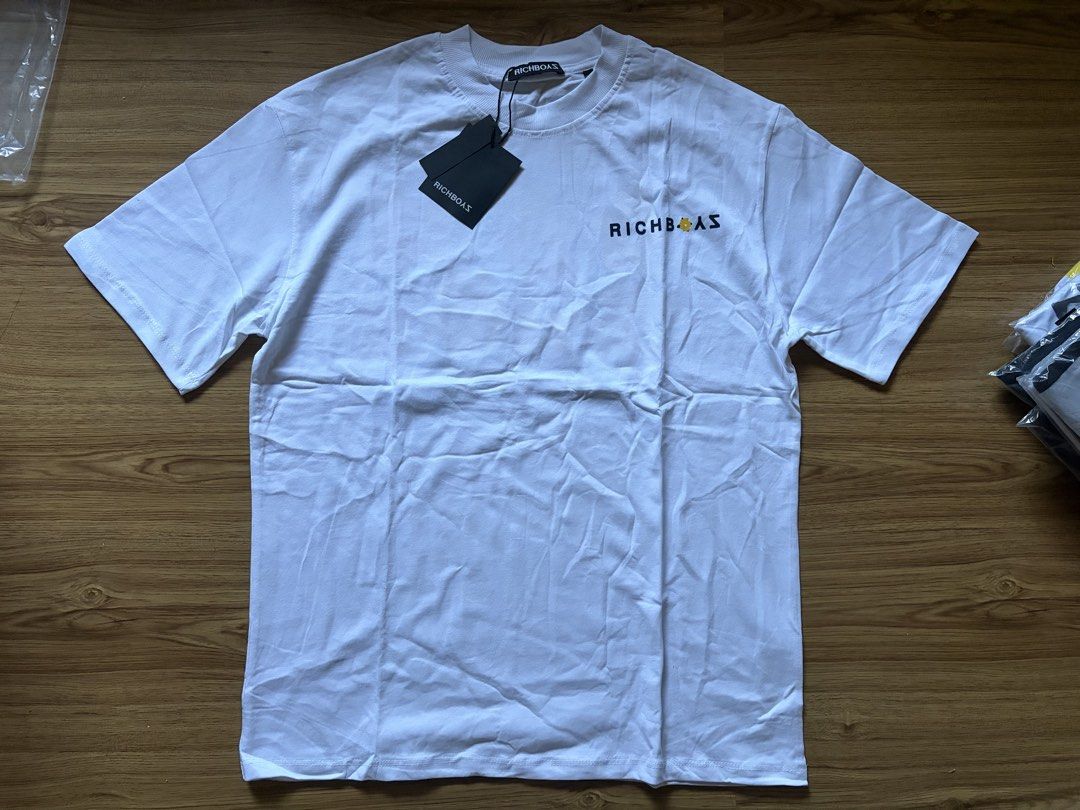 Richboyz Box Tee Shirt (Category: Tshirts & Polo Shirts ) located in San Pedro. Submitted by nikkiabc.777 (Listing ID 1466807275, Image 1). Description: Richboyz Box Tee Shirt - size: Medium - brandnew; with ziplock and tag - thick fabric - with tag price ₱1,600 - can be unisex .