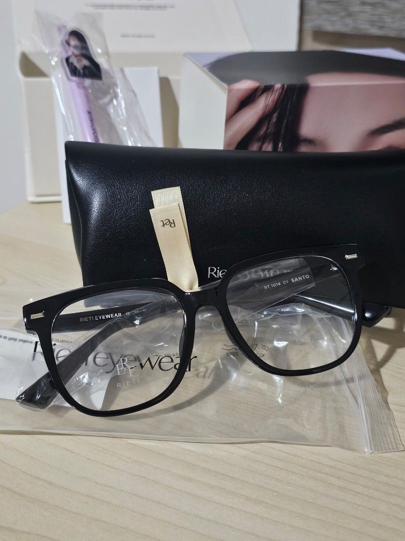 Rieti (Category: Sunglasses & Eyewear) located in Paranaque City. Submitted by mab.villareal (Listing ID 1466870273, Image 3). Description: Rieti Santo RT 1014 C1 glasses frame in black. Oversized square shape, thick rims. Complete set including original black leatherette hard case, outer packaging box, etc. It has free ballpen inside din. From Korea. FIXED PRICE.
