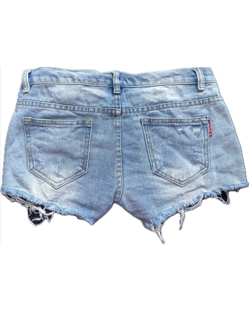 Ripped denim shorts (Category: Shorts) located in Bacoor. Submitted by pickedbykoko (Listing ID 1466916524, Image 2). Description: Size: 28 inches Length: 9 inches Condition: Very Good Flaws: stain at the left back pocket, as shown in the 3rd photo 🏷 ₱78.00 Code: K02.
