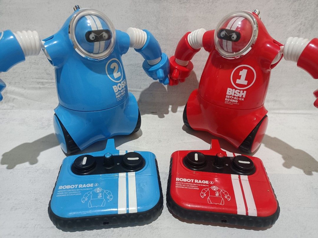 Robo Rage RC Robot Boxer Set | Remote Control Robot (Category: Remote Control Toys) located in Davao. Submitted by zeek_key_collectibles (Listing ID 1466953945, Image 1). Description: Robots and Remote Control works perfectly fine. Here are the core mechanics of how to play: • Dual-Joystick Controls: Each player uses a dedicated remote control to pilot their robot. One joystick maneuvers the robot's movement (moving forward, backward, or turning)
