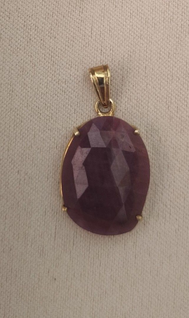 Ruby Pendant in Silver Settings, Gold Plating (Category: Necklaces) located in Batangas. Submitted by decluttering_bliss (Listing ID 1466775599, Image 1). Description: - Elegant ruby gemstone pendant set in classic yellow gold-plated silver metal - Large, vibrant rose-red stone with a sparkling faceted surface - Secure prong setting ensures the stone stays in place - Built-in loop bail ready for your favorite chain - Timeless and versatile design